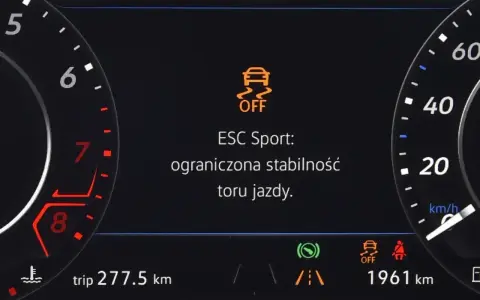 Kontrolka ESP OFF świeci się, informując o ograniczonej stabilności toru jazdy w trybie ESC Sport.